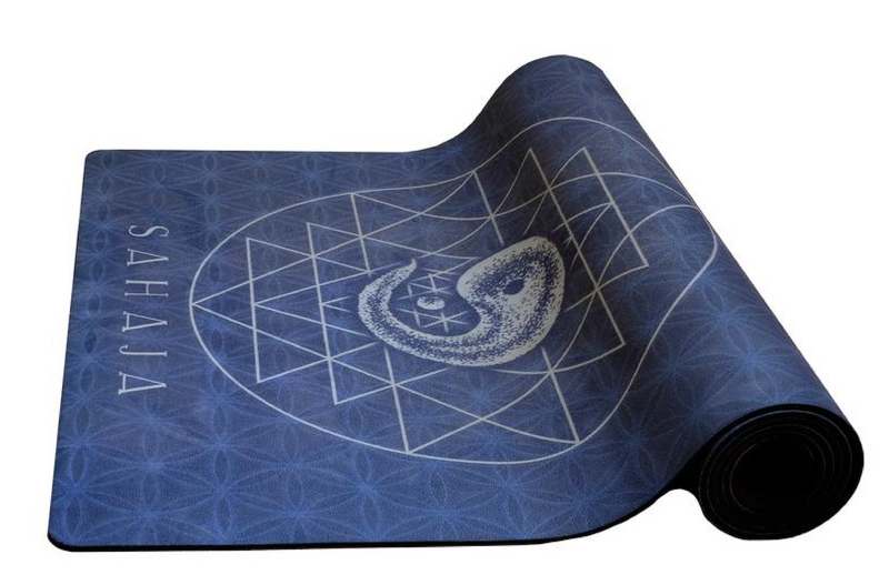 Sahaja yoga mat, yin yoga logo on blue background.